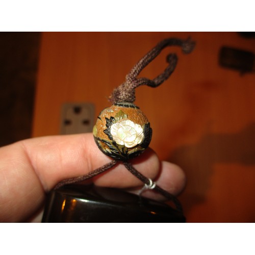 329 - Two Japanese Lacquer 5 Section Inros, one with an Ojime