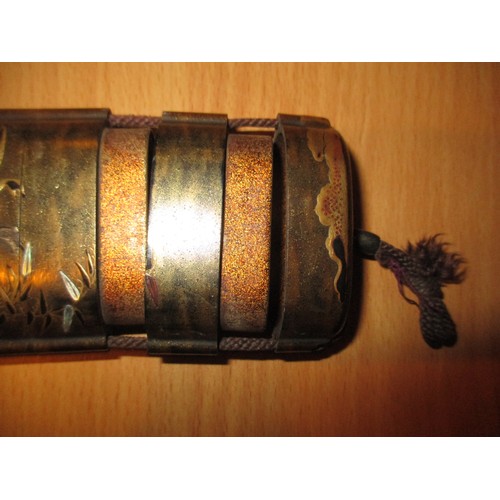 329 - Two Japanese Lacquer 5 Section Inros, one with an Ojime