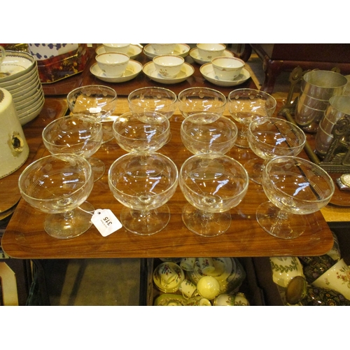 21 - Set of 12 Engraved Glass Champagne Coupes