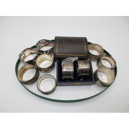539 - Four Pairs of Silver Napkin Rings, 160g, and a Pair of Plated Napkin Rings