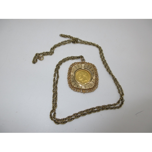 1912 Gold Half Sovereign in a 9ct Gold Mount and with a Metal Chain, 21.13g total