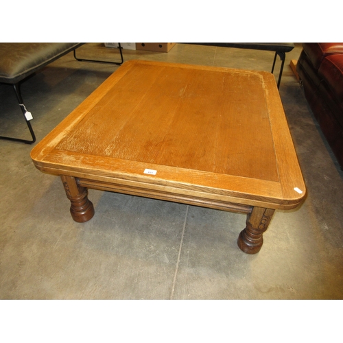 631 - 1920's Oak Draw Leaf Coffee Table, 106x90x37cm high, each leaf 23cm