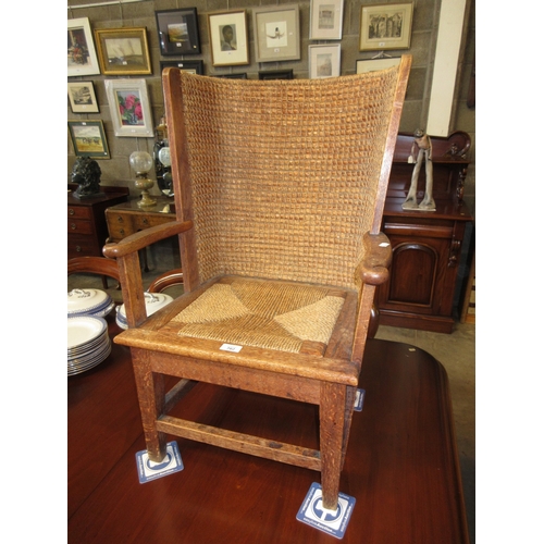 702 - Early 20th Century Childs Oak Orkney Chair having a Woven Seat