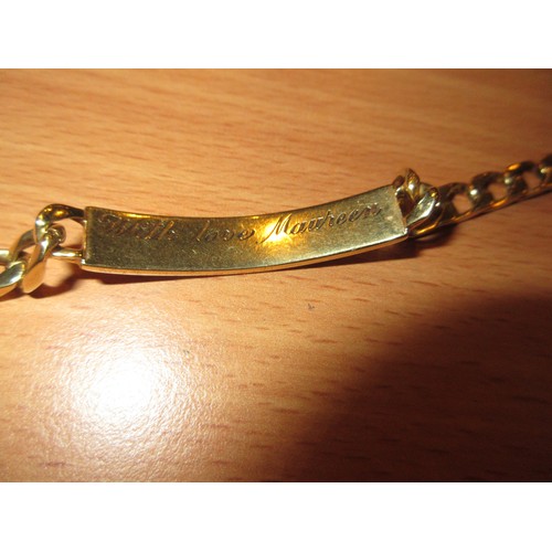 333 - 750 Gold ID Bracelet, 31.3g, engraved with an inscription