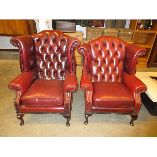 500 - Pair of Ladies and Gents Burgundy Leather Deep Buttoned Wing Back Chesterfield Chairs