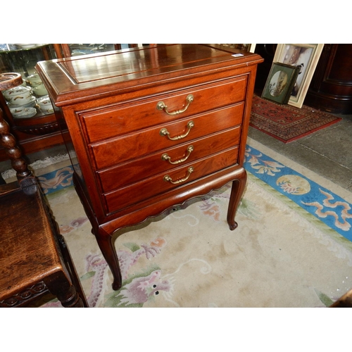 111 - A modern Chinese canteen table fitted four drawers, on slender cabriole legs - 24in. wide