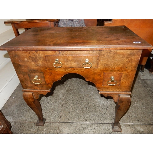 116 - A Georgian elm lowboy fitted three drawers, on heavy cabriole legs - 29 1/2in. wide