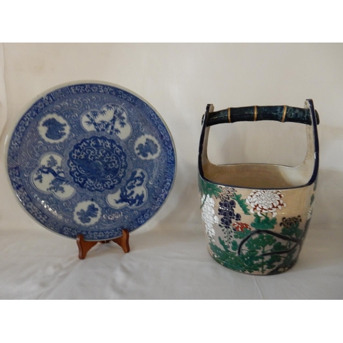 141 - A Japanese blue and white plate decorated bamboo - 12in. dia. and a pail decorated wisteria - 12in. ... 