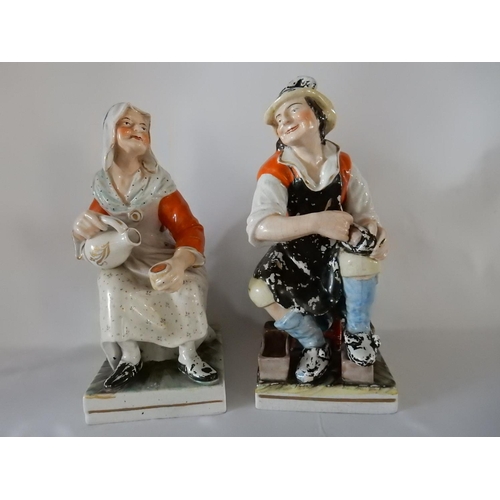 152 - A large pair of Staffordshire figures - The Cobbler and His Wife - 14in. high