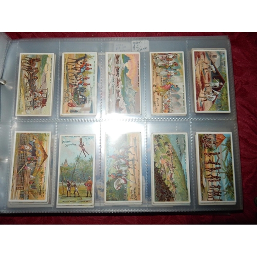 23 - An album of cigarette cards including Scottish Co Op Triumph of Engineering, Players Empire series, ... 