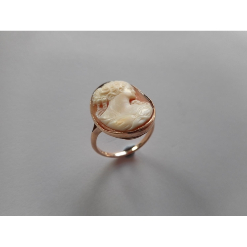 236 - A lady's ring set carved shell cameo depicting head and shoulders of a lady, on a 9ct. gold shank