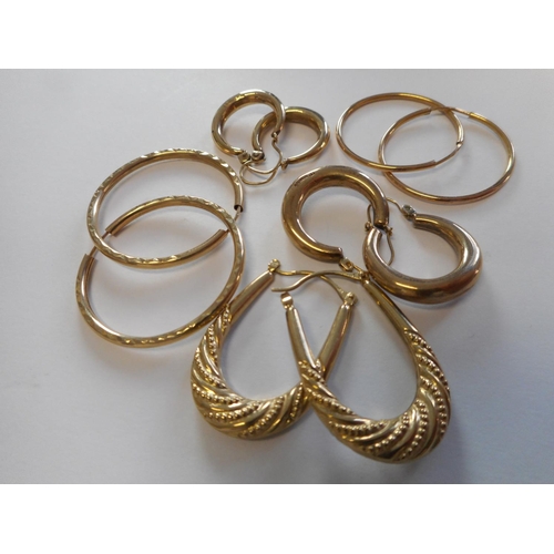 245 - Five pairs of 9ct. gold hoop earrings various