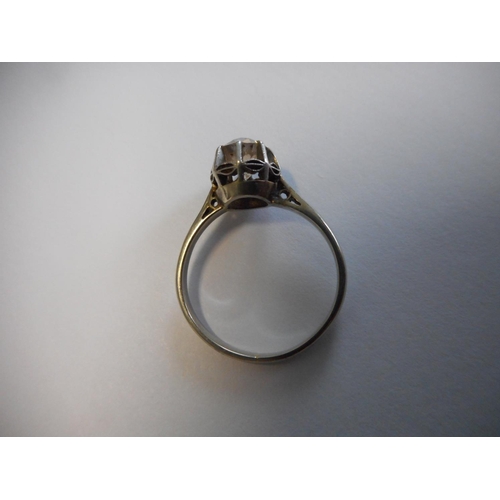 249 - A lady's solitaire diamond ring, on a white gold coloured metal shank