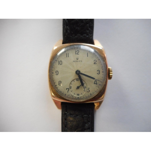 257 - A gentleman's Rolex wristwatch in a 9ct. gold presentation case, on a leather strap