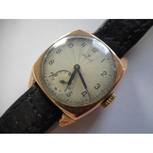 257 - A gentleman's Rolex wristwatch in a 9ct. gold presentation case, on a leather strap