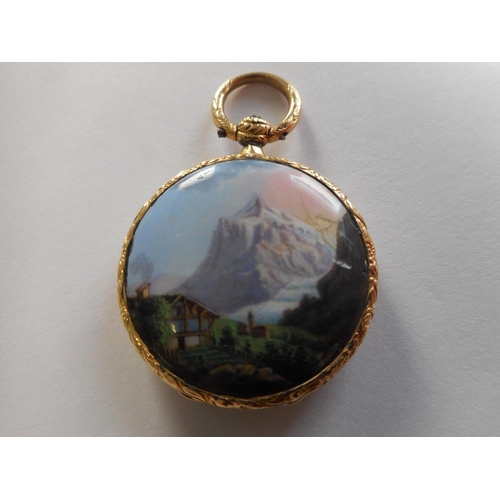 258 - A gold coloured metal double sided locket with enamel floral panel and snow covered mountain to the ... 