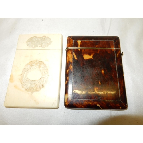 267 - A late 19th Century carved ivory card case and a Victorian tortoiseshell ditto