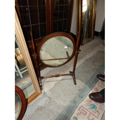 30 - A 19th Century rectangular wall mirror in a rosewood frame with gilt slip - 29in. x 23in., a modern ... 