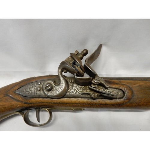 301 - A flintlock style pistol - 20in. long