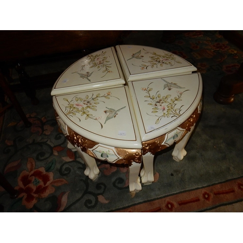 62 - A modern Chinese style occasional table in white and gilt with soapstone style decoration of figures... 