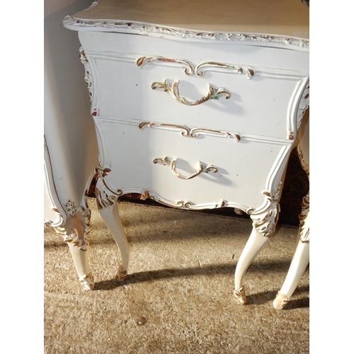 63 - A pair of white and gilt chests, each fitted five drawers and a pair of similar bedside chests