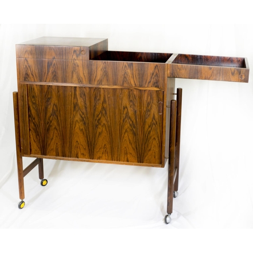 67 - A mid 20th Century Danish rosewood cocktail cabinet by Mogens Kold Denmark with exo skeletal leg con... 