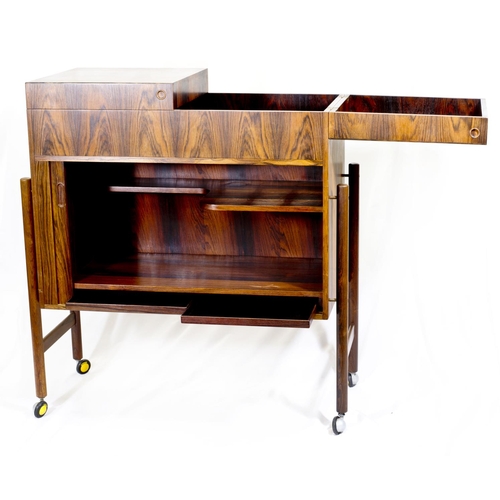 67 - A mid 20th Century Danish rosewood cocktail cabinet by Mogens Kold Denmark with exo skeletal leg con... 