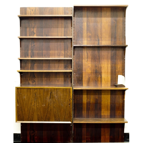 70 - A mid 20th Century Danish rosewood wall unit possibly designed by Poul Cadovius in two sections with... 