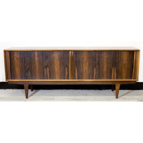 71 - A mid 20th Century Danish rosewood sideboard designed by Bernhard Pedersen with tambour doors and fi... 