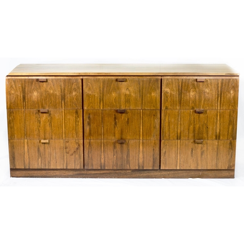 73 - A mid 20th Century Danish rosewood chest fitted nine drawers possibly designed by Arne Vodder - 60in... 