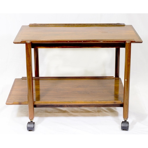 74 - A mid 20th Century Danish rosewood tea trolley possibly designed by Poul Hundevad - 29 1/2in. wide, ... 