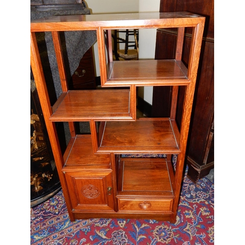 90 - A nest of three modern Chinese hardwood occasional tables, the largest - 17in. wide and a similar wh... 