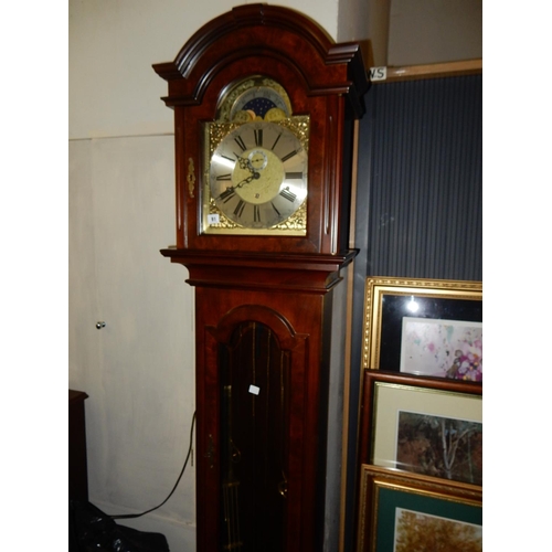 91 - A reproduction longcase clock by Warmink, moonphase to the arch, in a mahogany and glass case