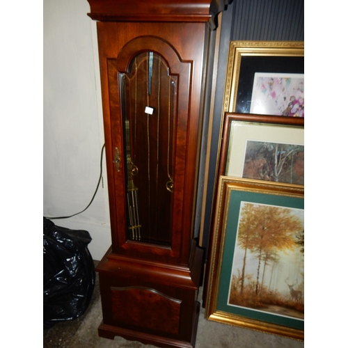 91 - A reproduction longcase clock by Warmink, moonphase to the arch, in a mahogany and glass case