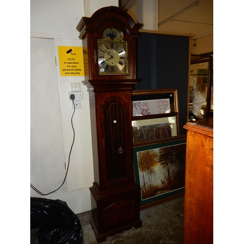 91 - A reproduction longcase clock by Warmink, moonphase to the arch, in a mahogany and glass case