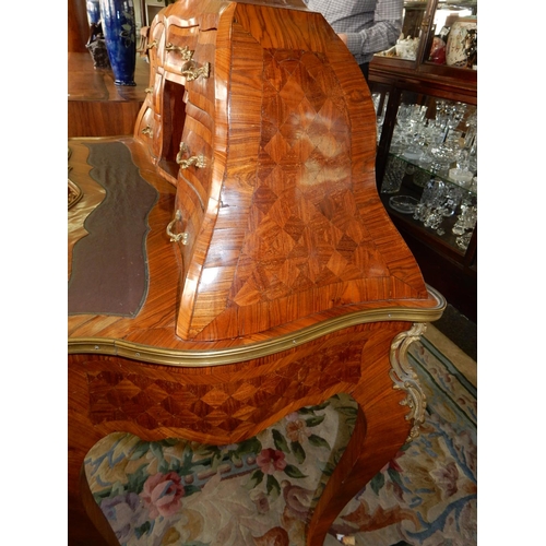 95 - A French kingwood bureau de dame, the raised back inset medallion, fitted five drawers and centre re... 