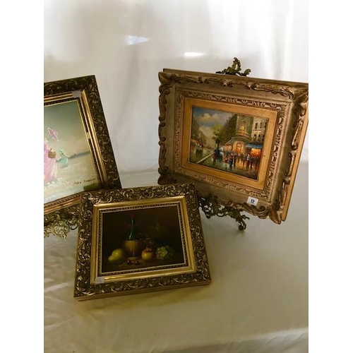 12 - A pair of oils on panel - Paris street scenes, gilt framed, a beach scene by Marie Charlot and a sti... 