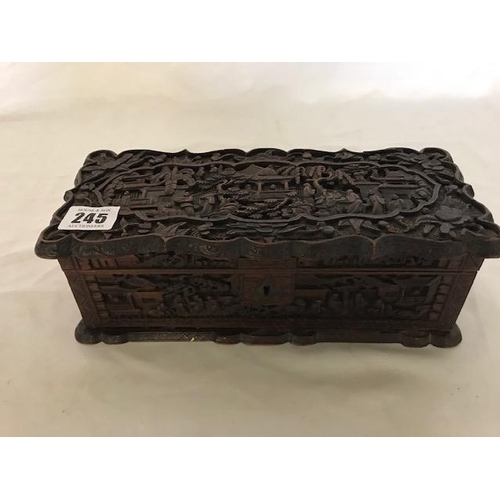 245 - A 19th Century Cantonese cedar wood box with all over carved decoration of figures in garden scenes ... 