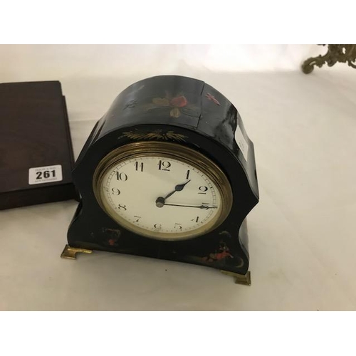 261 - A Regency rosewood and brass inlaid clock bracket, a mantel clock in a lacquered case and a papier m... 