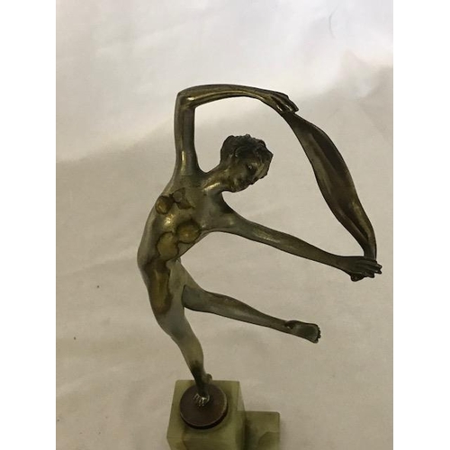 265 - An Art Deco silvered bronze figure of a nude female holding a scarf above her head, on onyx base, si... 