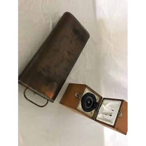 268 - A compass in fitted wooden box and a copper car foot warmer