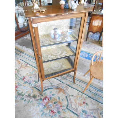 36 - An Edwardian mahogany display cabinet fitted glass door and sides, on splayed legs - 24in. wide