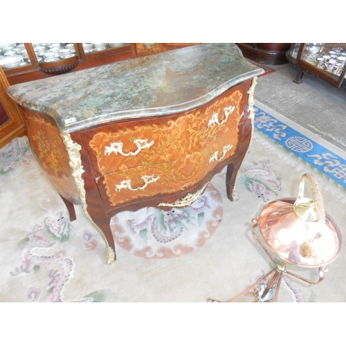 57 - A Continental kingwood commode of bombe form with floral marquetry decoration, marble top, fitted tw... 