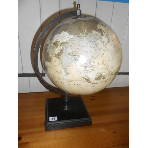 59 - A modern globe on stand, a Royal Doulton model of a pony, a Continental group of a shire horse and p... 