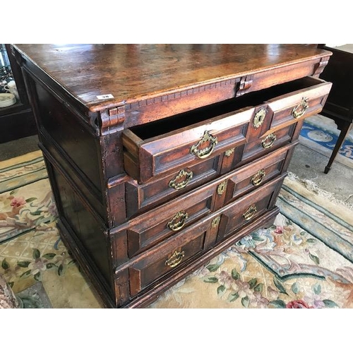 38 - A late 17th Century Jacobean oak chest fitted four drawers with ornate lock escutcheons, brass handl... 