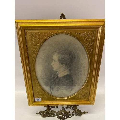 12 - A Victorian pencil sketch - Head and shoulders of a young boy, in a gilt mount, framed and glazed - ... 