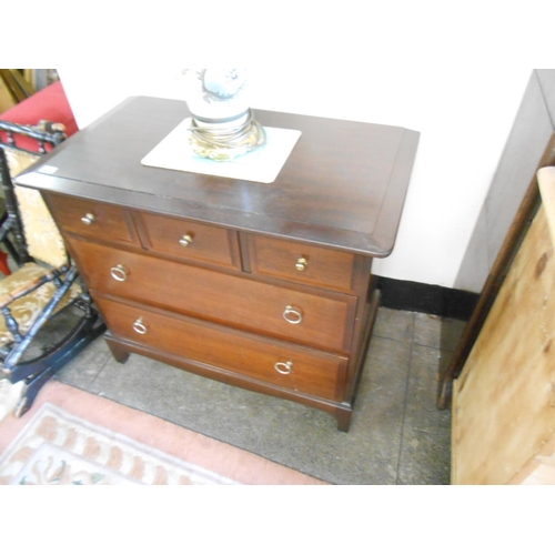 143 - Two Stag mahogany chests each fitted three narrow and two wide drawers - 32in. wide