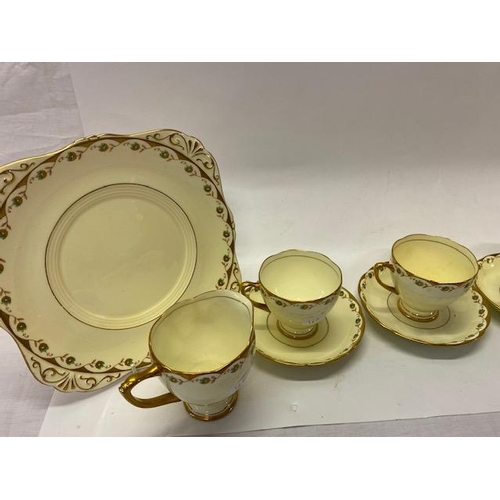 160 - A Grafton tea service, yellow with flowers and gilding comprising:- twelve cups, twelve saucers, twe... 