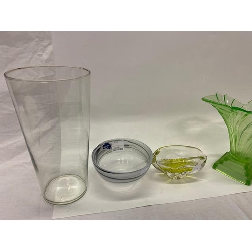 179 - A Monart style vase in green, a yellow and clear vase, two Art Deco uranium style vases, a large cyl... 