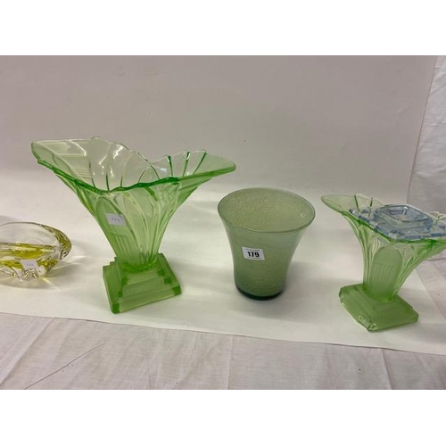 179 - A Monart style vase in green, a yellow and clear vase, two Art Deco uranium style vases, a large cyl... 